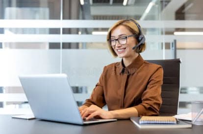 Business professional using a laptop in an office